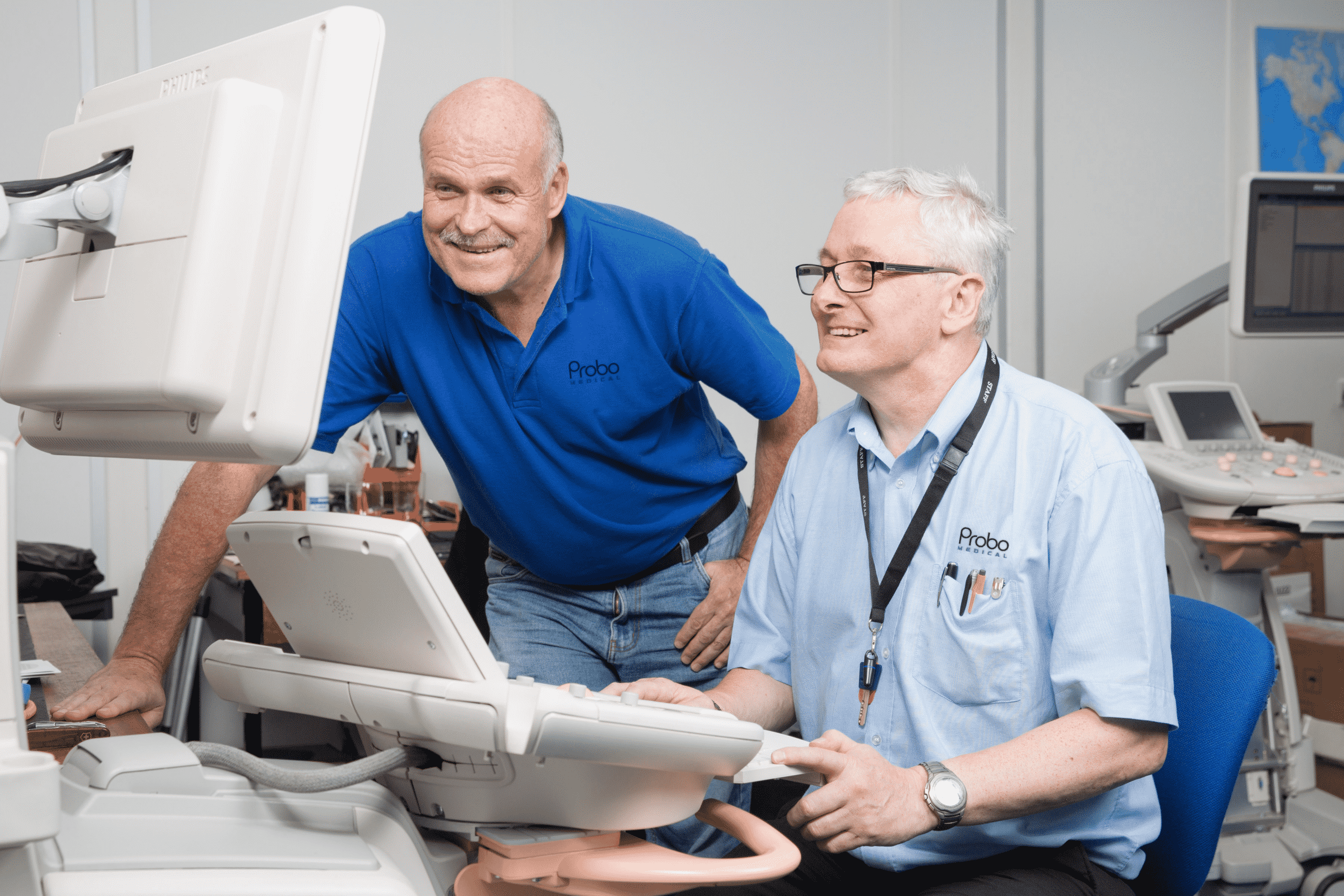 Engineers repairing an ultrasound machine